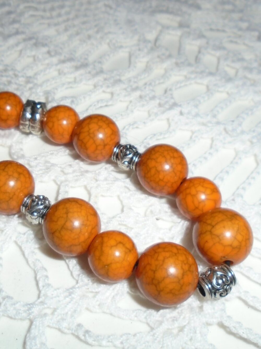 Burnt orange raku style stretch bead bracelet
